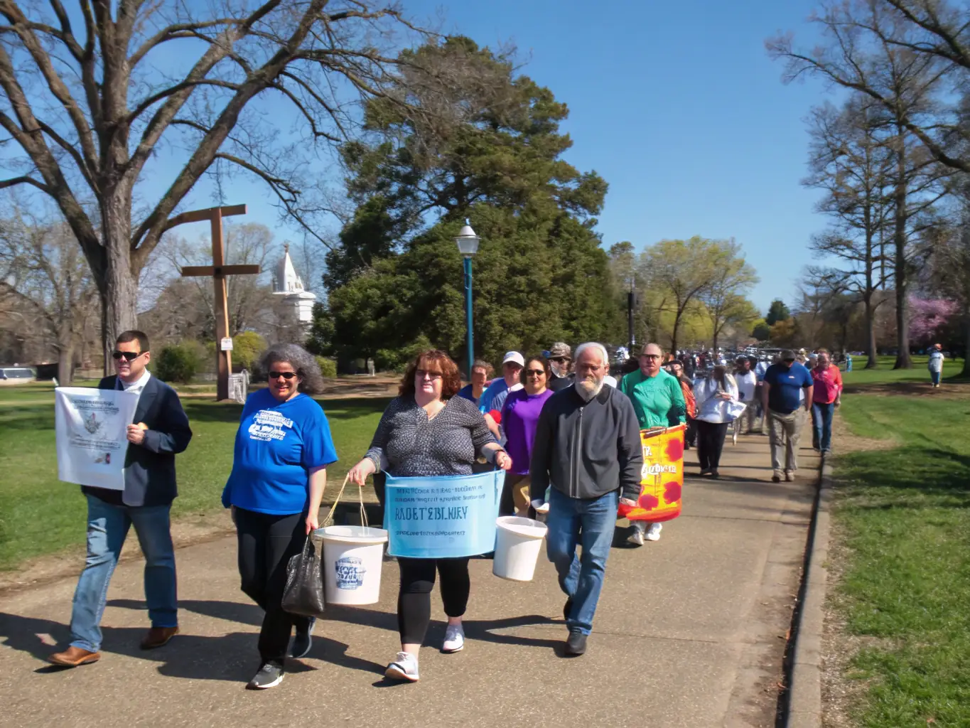 Students participating in a mission trip, sharing the gospel in a community setting, representing the Missions and Evangelism Diploma program.
